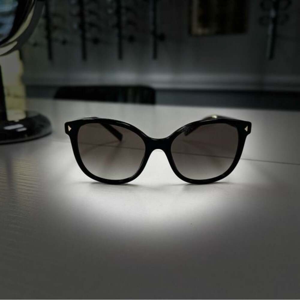Prada Elegant Black Sunglasses